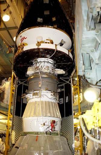 KENNEDY SPACE CENTER, FLA. - At Launch Complex 17-B, Cape Canaveral Air Force Station, the spacecraft fairing is being installed around the Mars Exploration Rover-1 (MER-B). The second of twin rovers being sent to Mars, it is equipped with a robotic arm, a drilling tool, three spectrometers, and fou