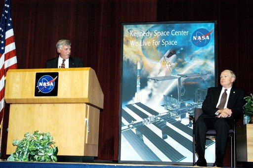 KENNEDY SPACE CENTER, FLA. -  KSC Deputy Director James W. Kennedy addresses a group of KSC employees assembled in the KSC Training Auditorium, as KSC Director Roy D. Bridges looks on (right). The occasion is the announcement of Kennedy as the next director of the NASA Kennedy Space Center (KSC) in 