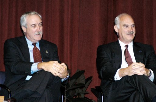 KENNEDY SPACE CENTER, FLA. -  NASA Administrator Sean O'Keefe (left) and NASA Associate Administrator of Space Flight William F. Readdy address a group of KSC employees assembled in the KSC Training Auditorium. The occasion is the announcement of James W. Kennedy as the next director of the NASA Ken