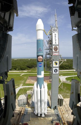 KENNEDY SPACE CENTER, FLA. -  The Mobile Service Tower is rolled back at Space Launch Complex 17B, Cape Canaveral Air Force Station, to reveal the Delta II Heavy launch vehicle ready for launch of the Mars Exploration Rover-B (MER-B) mission, with the rover "Opportunity" aboard. The second of twin r