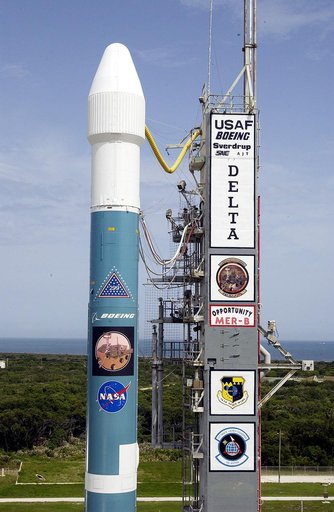 KENNEDY SPACE CENTER, FLA. -  The Mobile Service Tower is rolled back at Space Launch Complex 17B, Cape Canaveral Air Force Station, to reveal the Delta II Heavy launch vehicle ready for launch of the Mars Exploration Rover-B (MER-B) mission, with the rover "Opportunity" aboard. The second of twin r