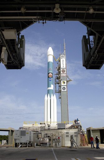 KENNEDY SPACE CENTER, FLA. -  The Mobile Service Tower is rolled back at Space Launch Complex 17B, Cape Canaveral Air Force Station, to reveal the Delta II Heavy launch vehicle ready for launch of the Mars Exploration Rover-B (MER-B) mission, with the rover "Opportunity" aboard. The second of twin r