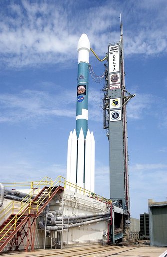 KENNEDY SPACE CENTER, FLA. -  The Mobile Service Tower is rolled back at Space Launch Complex 17B, Cape Canaveral Air Force Station, to reveal the Delta II Heavy launch vehicle ready for launch of the Mars Exploration Rover-B (MER-B) mission, with the rover "Opportunity" aboard. The second of twin r