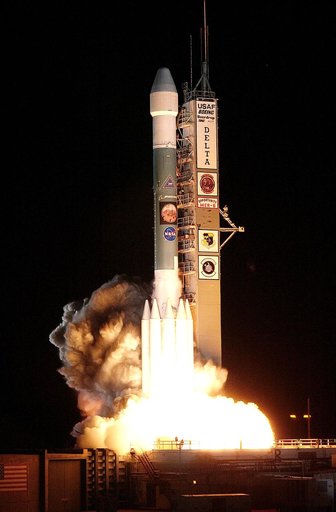 KENNEDY SPACE CENTER, FLA. - On Launch Complex 17-B, Cape Canaveral Air Force Station, the Delta II Heavy launch vehicle carrying the rover "Opportunity" for the second Mars Exploration Rover mission launches at 11:18:15 p.m. EDT.  Opportunity will reach Mars on Jan. 25, 2004. Together the two MER r