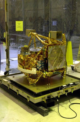KENNEDY SPACE CENTER, FLA. -   The SciSat-1 spacecraft is revealed after being uncrated at Vandenberg Air Force Base, Calif.  SciSat-1 weighs approximately 330 pounds and will be placed in a 400-mile-high polar orbit to investigate processes that control the distribution of ozone in the upper atmosp