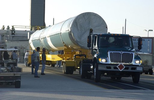 KENNEDY SPACE CENTER, FLA. -   On Launch Complex 17-B, Cape Canaveral Air Force Station, the first stage of a Delta II rocket waits to be lifted up into the mobile service tower.  The rocket is being erected to launch the Space InfraRed Telescope Facility (SIRTF).  Consisting of an 0.85-meter telesc