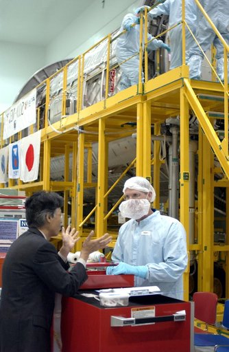 KENNEDY SPACE CENTER, FLA. -   STS-115 Mission Specialist Joseph Tanner is dressed in protective gear to enter the Japanese Experiment Module (JEM) Pressurized Module located in the Space Station Processing Facility. Known as Kibo, the JEM consists of six components: two research facilities -- the P