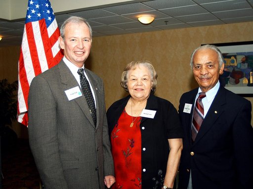 KENNEDY SPACE CENTER, FLA. - (From left) Brian Duffy, Lockheed Martin vice president/associate program manager, Mildred Carter and Col. (Ret.) Herbert E. Carter, one of the Tuskegee Airmen, attend a dinner sponsored by the KSC Spaceflight and Life Sciences Office.  Col. Carter was a guest speaker at