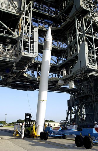 KENNEDY SPACE CENTER, FLA. -   A solid rocket booster (SRB) is lifted to vertical on Launch Complex 17-B, Cape Canaveral Air Force Station. The SRB will be attached to the Delta II Heavy rocket that will launch the Space Infrared Telescope Facility (SIRTF).  The Delta II Heavy features nine 46-inch-