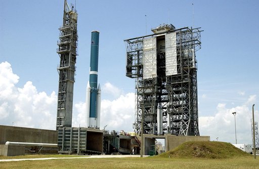 KENNEDY SPACE CENTER, FLA. -   On Launch Complex 17-B, Cape Canaveral Air Force Station, the Delta II Heavy rocket waits the arrival of the mobile service tower with three additional solid rocket boosters (SRBs).  Nine 46-inch-diameter, stretched SRBs will help launch the Space Infrared Telescope Fa