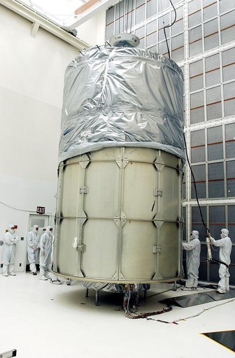 KENNEDY SPACE CENTER, FLA.  -  In Hangar A&E, Cape Canaveral Air Force Station, encapsulation of the Space Infrared Telescope Facility (SIRTF) is complete.  The spacecraft will be transported to Launch Complex 17-B for mating with its launch vehicle, the Delta II rocket.   SIRTF consists of three cr