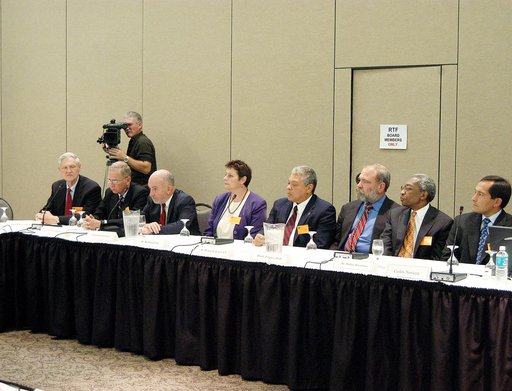 KENNEDY SPACE CENTER, FLA.  -  The Return To Flight Task Group (RTFTG) holds the first public meeting at the Debus Center, KSC Visitor Complex.  Members and staff at the table, from left, are retired Navy Rear Adm. Walter H. Cantrell, David Raspet, retired Air Force Col. Gary S. Geyer, Dr. Kathryn C