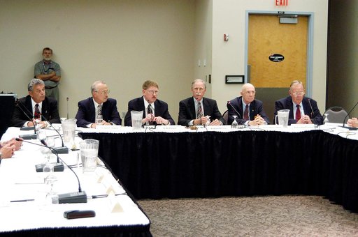 KENNEDY SPACE CENTER, FLA.  -  The Return To Flight Task Group (RTFTG) holds the first public meeting at the Debus Center, KSC Visitor Complex.  Members and staff at this table, from left, are Joseph W. Cuzzupolui, retired Army Col. James C. Adamson, David Lenyel, co-chairs Richard O. Covey and reti