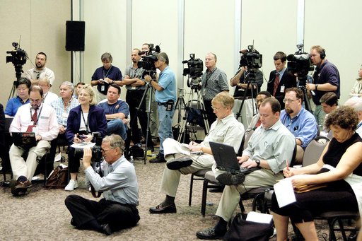 KENNEDY SPACE CENTER, FLA.  -  The news media capture the words and images of the Return To Flight Task Group (RTFTG) which held its first public meeting at the Debus Center, KSC Visitor Complex.  The group is co-chaired by former Shuttle commander Richard O. Covey and retired Air Force Lt. Gen. Tho
