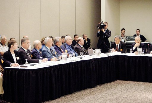 KENNEDY SPACE CENTER, FLA.  - The Return To Flight Task Group (RTFTG) holds the first public meeting at the Debus Center, KSC Visitor Complex.  Shown at the table on the left are Dr. Amy K. Donahue, James D. Lloyd, Robert Sieck, retired Air Force Lt. Gen. Forrest C. McCartney, Richard Kohrs, Sy Rube