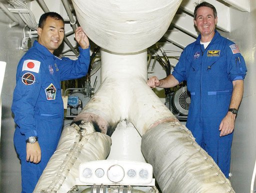KENNEDY SPACE CENTER, FLA. -  STS-114  Mission Specialists Soichi Noguchi and Stephen Robinson visit the engine room of the Liberty Star, one of two SRB Retrieval Ships.  Noguchi is with the Japanese space agency NASDA. Other crew members on the tour are Commander Eileen Collins and Pilot James Kell