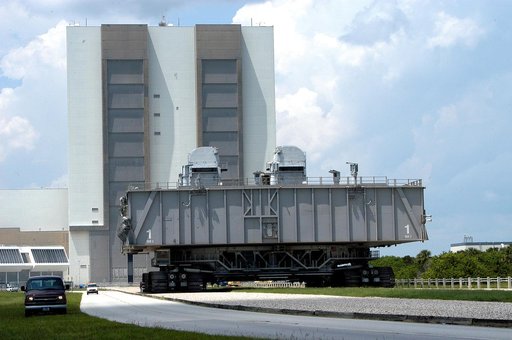 KENNEDY SPACE CENTER, FLA.  -  Crawler-transporter (CT) number 2, moves away from the Vehicle Assembly Building with a Mobile Launcher Platform (MLP) on top on a test run to the launch pad.  The CT recently underwent modifications to the cab.  The CT moves Space Shuttle vehicles, situated on the MLP