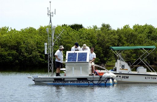 KENNEDY SPACE CENTER, FLA.  -  Researchers conduct underwater acoustic research in the Launch Complex 39 turn basin.  Several government agencies, including NASA, NOAA, the Navy, the Coast Guard, and the Florida Fish and Wildlife Commission are involved in the testing. The research involves demonstr