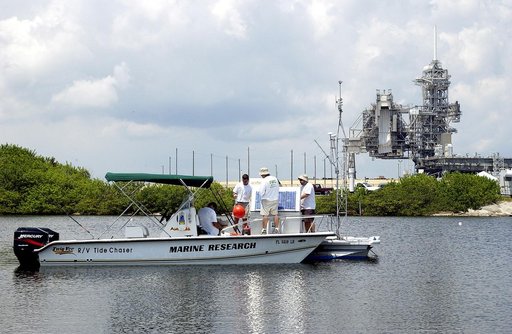KENNEDY SPACE CENTER, FLA.  -  Researchers utilize several types of watercraft to conduct underwater acoustic research in the Launch Complex 39 turn basin near Launch Pad 39A.  Several government agencies, including NASA, NOAA, the Navy, the Coast Guard, and the Florida Fish and Wildlife Commission 
