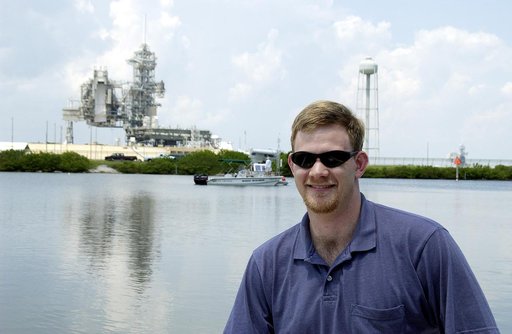 KENNEDY SPACE CENTER, FLA.  -  Justin Manley, of the National Oceanic and Atmospheric Administration, is a member of the research team conducting underwater acoustic research in the Launch Complex 39 turn basin near Launch Pad 39A.  Several government agencies, including NASA, NOAA, the Navy, the Co
