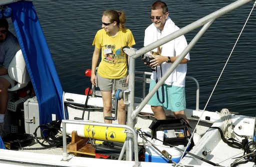 KENNEDY SPACE CENTER, FLA.  -  Research team members take their places on one of the watercraft being utilized to conduct underwater acoustic research in the Launch Complex 39 turn basin.  Several government agencies, including NASA, NOAA, the Navy, the Coast Guard, and the Florida Fish and Wildlife