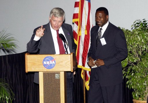 KENNEDY SPACE CENTER, FLA.  -  KSC Director Jim Kennedy (left) and incoming KSC Deputy Director Woodrow Whitlow talk about One NASA during the rollout of the Agency initiative at KSC.  They were joined at the IMAX Theater® by other NASA leaders James Jennings,  NASA’s associate deputy administrator 