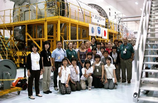 KENNEDY SPACE CENTER, FLA. -   Japanese girls from Urawa Daiichi Girls High School, Urawa, Japan, pose for a group photo during a visit to the Space Station Processing Facility. They were awarded the trip to Kennedy Space Center when their experiments were chosen to fly on mission STS-107. The girls