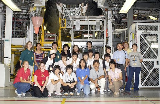 KENNEDY SPACE CENTER, FLA. -   Japanese girls from Urawa Daiichi Girls High School, Urawa, Japan, pose for a group photo during a visit to the Orbiter Processing Facility. They were awarded the trip to Kennedy Space Center when their experiments were chosen to fly on mission STS-107. The girls are a