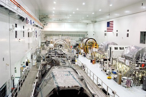 KENNEDY SPACE CENTER, FLA. -  Various elements intended for the International Space Station are lined up in the Space Station Processing Facility.  The newest to arrive at KSC are in the rear: at left, the U.S. Node 2, and at right, the Japanese Experiment Module (JEM).  The two elements are undergo