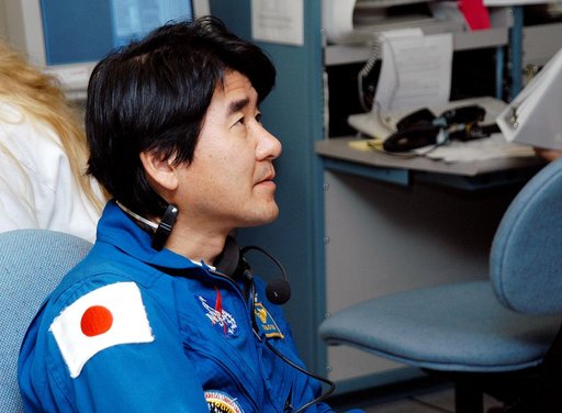 KENNEDY SPACE CENTER, FLA. -  Takao Doi, an astronaut with the National Space Development Agency of Japan (NASDA), watches the sensors  during a Multi-Equipment Interface Test (MEIT) on the Japanese Experiment Module (JEM).  NASDA  developed the laboratory at the Tsukuba Space Center near Tokyo. It 