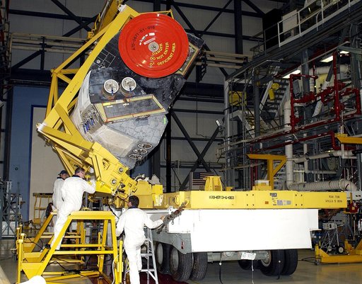KENNEDY SPACE CENTER, FLA. - In the Orbiter Processing Facility, an Orbital Maneuvering System (OMS) pod removed from  the orbiter Atlantis during routine maintenance.
