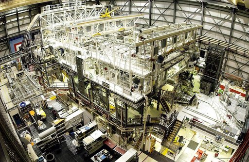 KENNEDY SPACE CENTER, FLA. - This bird's-eye view of a high bay in the Orbiter Processing Facility (OPF) shows Space Shuttle Atlantis surrounded by the standard platforms and equipment required to process a Space Shuttle orbiter for flight.  The high bay is 197 feet (60 meters) long, 150 feet (46 me