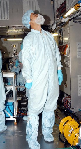 KENNEDY SPACE CENTER, FLA. -   Astronaut Soichi Noguchi, with the National Space Development Agency of Japan (NASDA), is inside the Japanese Experiment Module (JEM), undergoing a Multi-Element Integrated Test (MEIT)  in the Space Station Processing Facility.  Noguchi is assigned to mission STS-114 a