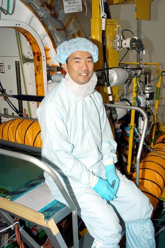 KENNEDY SPACE CENTER, FLA. -  Astronaut Soichi Noguchi, with the National Space Development Agency of Japan (NASDA), rests inside the Japanese Experiment Module (JEM), undergoing a Multi-Element Integrated Test (MEIT)  in the Space Station Processing Facility.  Noguchi is assigned to mission STS-114
