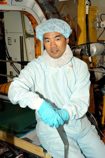 KENNEDY SPACE CENTER, FLA. -  Astronaut Soichi Noguchi, with the National Space Development Agency of Japan (NASDA), rests inside the Japanese Experiment Module (JEM), undergoing a Multi-Element Integrated Test (MEIT)  in the Space Station Processing Facility.  Noguchi is assigned to mission STS-114