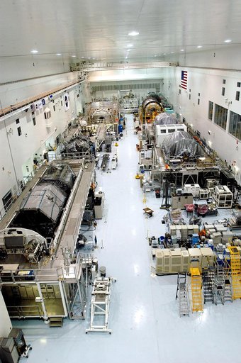 KENNEDY SPACE CENTER, FLA. -  Various elements intended for the International Space Station are lined up in the Space Station Processing Facility.  The newest to arrive at KSC are in the rear: at left, the U.S. Node 2, and next to it at right, the Japanese Experiment Module (JEM).  The two elements 