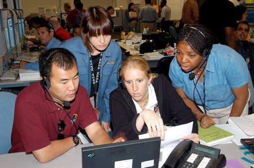KENNEDY SPACE CENTER, FLA. -  Astronaut Soichi Noguchi (left), with the National Space Development Agency of Japan (NASDA), points to data on the console during a Multi-Element Integrated Test (MEIT) of the U.S. Node 2 and the Japanese Experiment Module (JEM) in the Space Station Processing Facility