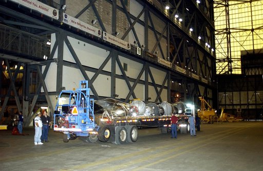 KENNEDY SPACE CENTER, FLA.  -  A flatbed truck carrying pieces of Columbia debris  arrives in the transfer aisle of the Vehicle Assembly Building.  The debris is being transferred to the VAB for permanent storage.  More than 83,000  pieces of debris were shipped to KSC during search and recovery eff