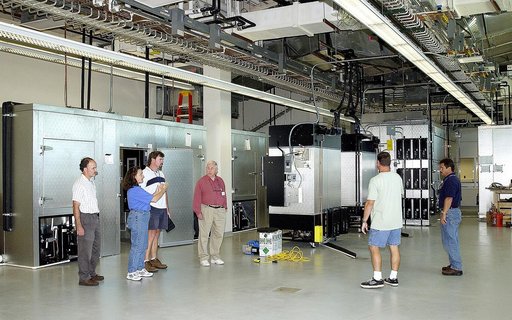 KENNEDY SPACE CENTER, FLA. -  Employees check out the new chamber facilities of the Space Life Sciences Lab (SLSL), formerly known as the Space Experiment Research and Processing Laboratory (SERPL).  From left are Ray Wheeler, with NASA; Debbie Wells and Larry Burns, with Dynamac; A.O. Rule, preside