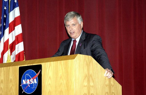 KENNEDY SPACE CENTER, FLA. -  Center Director Jim Kennedy talks to employees during his first all-hands meeting.  Making presentations were Dr. Woodrow Whitlow Jr., KSC deputy director,; Tim Wilson, assistant chief engineer for Shuttle; and Bill Pickavance, vice president and deputy program manager,