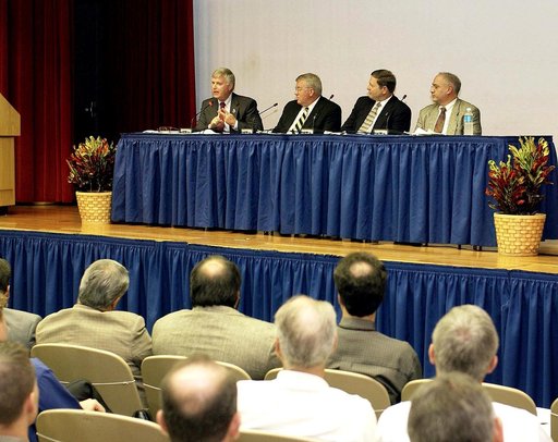 KENNEDY SPACE CENTER, FLA. -  Representatives from the Shuttle program and contractor team are part of Center Director Jim Kennedy’s first all-hands meeting for employees. From left are Kennedy, Bill Pickavance, Mike Wetmore and Bert Garrido.   They were on hand to discuss the Columbia Accident Inve