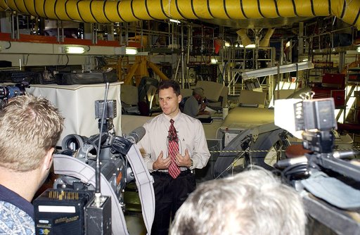 KENNEDY SPACE CENTER, FLA. -   NASA Vehicle Manager Scott Thurston talks to the media in the Orbiter Processing Facility.  The media was invited to see the orbiter Atlantis as it is being prepared for Return to Flight.  Both local and national reporters representing print and TV networks were able t