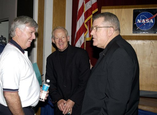 KENNEDY SPACE CENTER, FLA. -  Before the start of the kickoff presentation for Spaceport Super Safety and Health Day, Center Director Jim Kennedy (left) chats with guest speaker Capt. Charles Plumb (USNR retired) and United Space Alliance Vice President and Deputy Program Manager, Florida Operations
