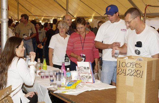KENNEDY SPACE CENTER, FLA. -   One of many vendors displaying their products during the Spaceport Super Safety and Health Day at KSC and Cape Canaveral Air Force Station, Florida Power and Light draws a crowd during a demonstration.  The annual KSC event is dedicated to reinforcing safe and healthfu