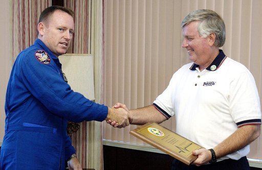 KENNEDY SPACE CENTER, FLA. -   Astronaut Barry E. Wilmore (left) congratulates Center Director Jim Kennedy after presenting him with a special award for Spaceport Super Safety and Health Day.
