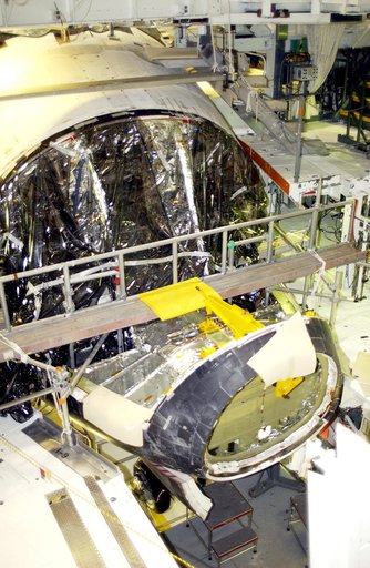 KENNEDY SPACE CENTER, FLA. - In the Orbiter Processing Facility, Atlantis is seen after its nose cap was removed for routine inspection. The nose cap is made of reinforced carbon-carbon (RCC), which has an operating range of minus 250° F to about 3,000° F.