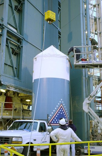 VANDENBERG AFB, CALIF. -  The interstage of the Delta II launch vehicle for the Gravity Probe B experiment is  prepared for lifting up the mobile service tower on Space Launch Complex 2, Vandenberg Air Force Base, Calif.  It will enclose the second stage.  The Gravity Probe B will launch a payload o