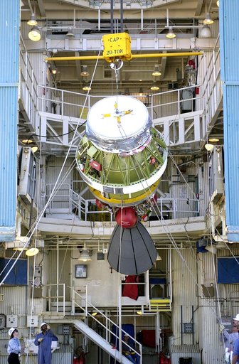 VANDENBERG AFB, CALIF. -  The second stage of the Delta II launch vehicle for the Gravity Probe B experiment is lifted up the mobile service tower on Space Launch Complex 2, Vandenberg Air Force Base, Calif.  The Gravity Probe B will launch a payload of four gyroscopes into low-Earth polar orbit to 