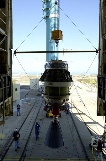 VANDENBERG AFB, CALIF. -  Viewed from inside, the second stage of the Delta II launch vehicle for the Gravity Probe B experiment is lifted up the mobile service tower on Space Launch Complex 2, Vandenberg Air Force Base, Calif.   The Gravity Probe B will launch a payload of four gyroscopes into low-