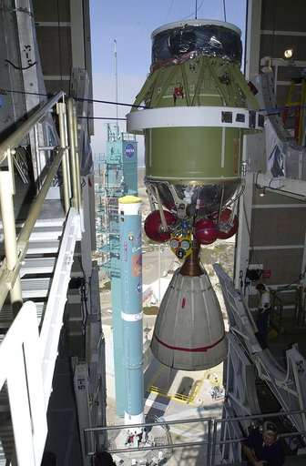 VANDENBERG AFB, CALIF. -  The second stage of the Delta II launch vehicle for the Gravity Probe B experiment is moved into the mobile service tower on Space Launch Complex 2, Vandenberg Air Force Base, Calif.   Behind it can be seen the first stage of the Delta II.  The Gravity Probe B will launch a